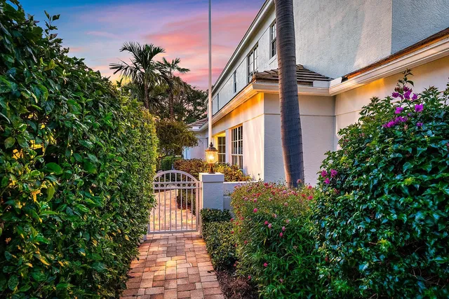 a bedroom with furniture and a flat screen tv