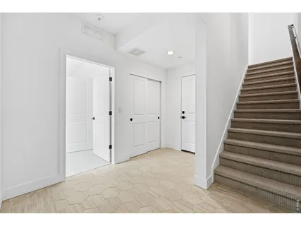 a view of an entryway with staircase