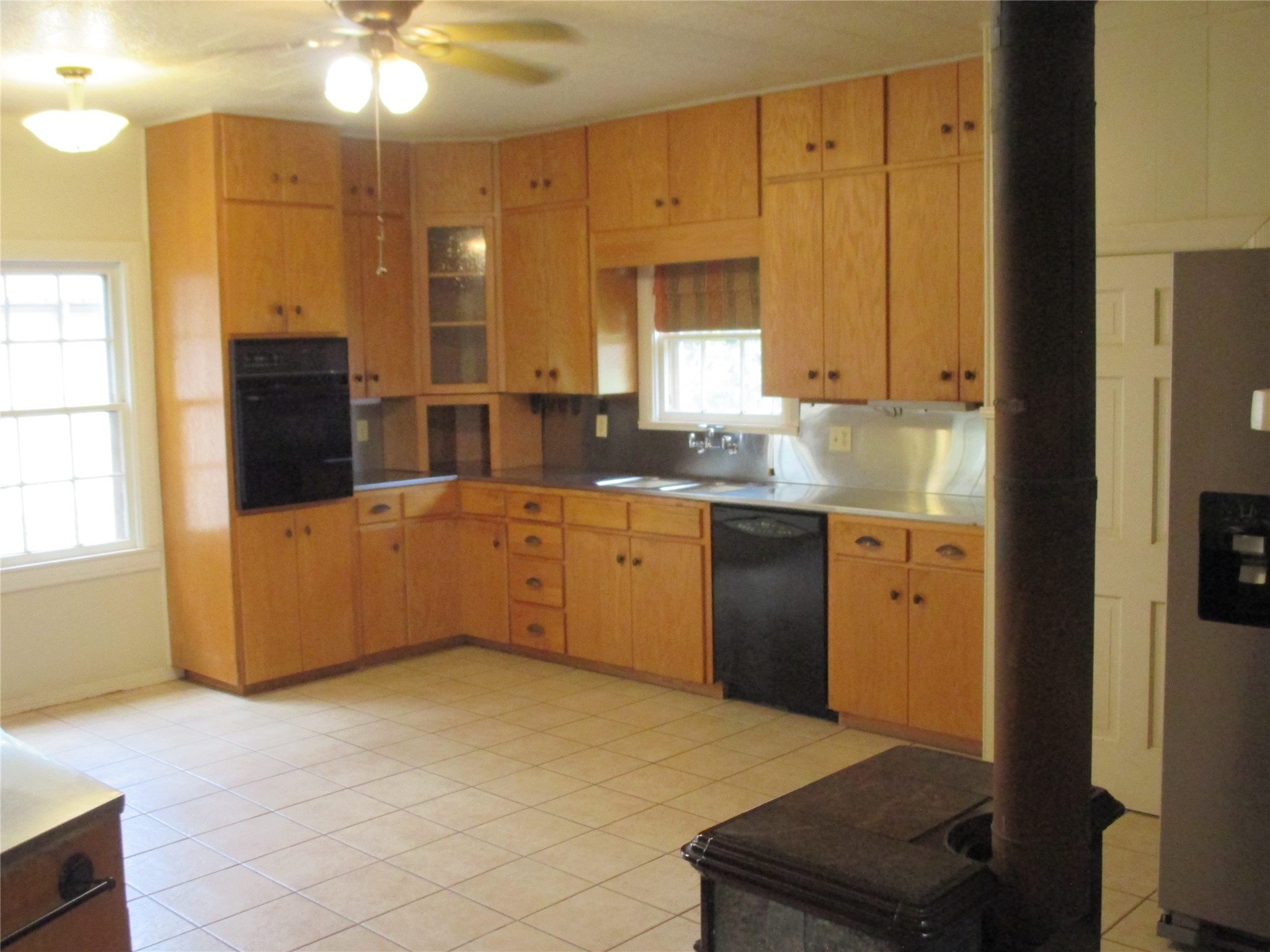 12610 Pecan School Road Bartlett, TX 76511 - Photo 6 of 21 Functional kitchen with ample cabinetry and a practical layout.