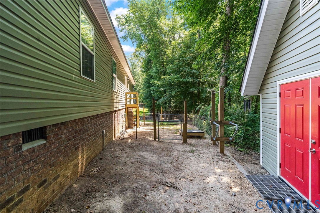 1755 Dispatch Road Quinton, VA 23141 - Photo 67 of 86 a view of a house with a backyard