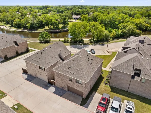 an aerial view of a house with a garden