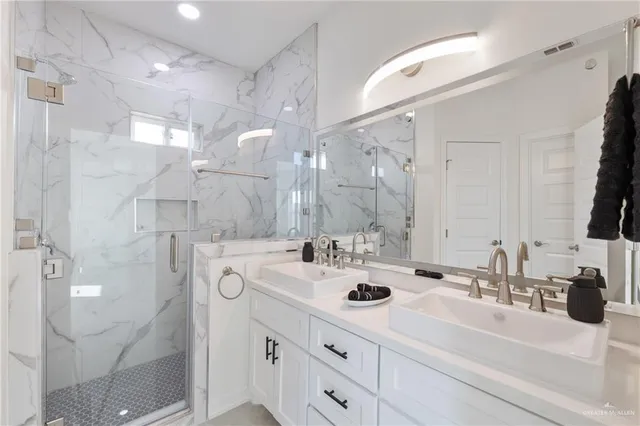 a bathroom with a sink and a mirror