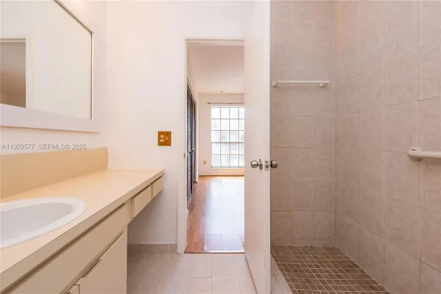 a bathroom with a sink and a bathtub