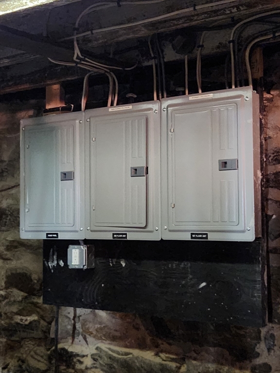 6 McIntyre Street Lowell, MA 01851 - Photo 9 of 12 a view of storage and utility room