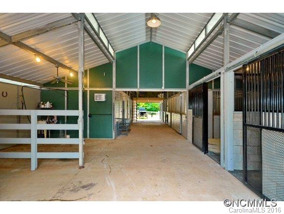 1180 Golf Course Road Tryon, NC 28782 - Photo 21 of 24 a view of a backyard of a house