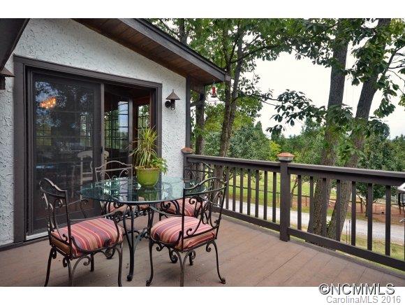 1180 Golf Course Road Tryon, NC 28782 - Photo 23 of 24 a view of balcony with chairs and table