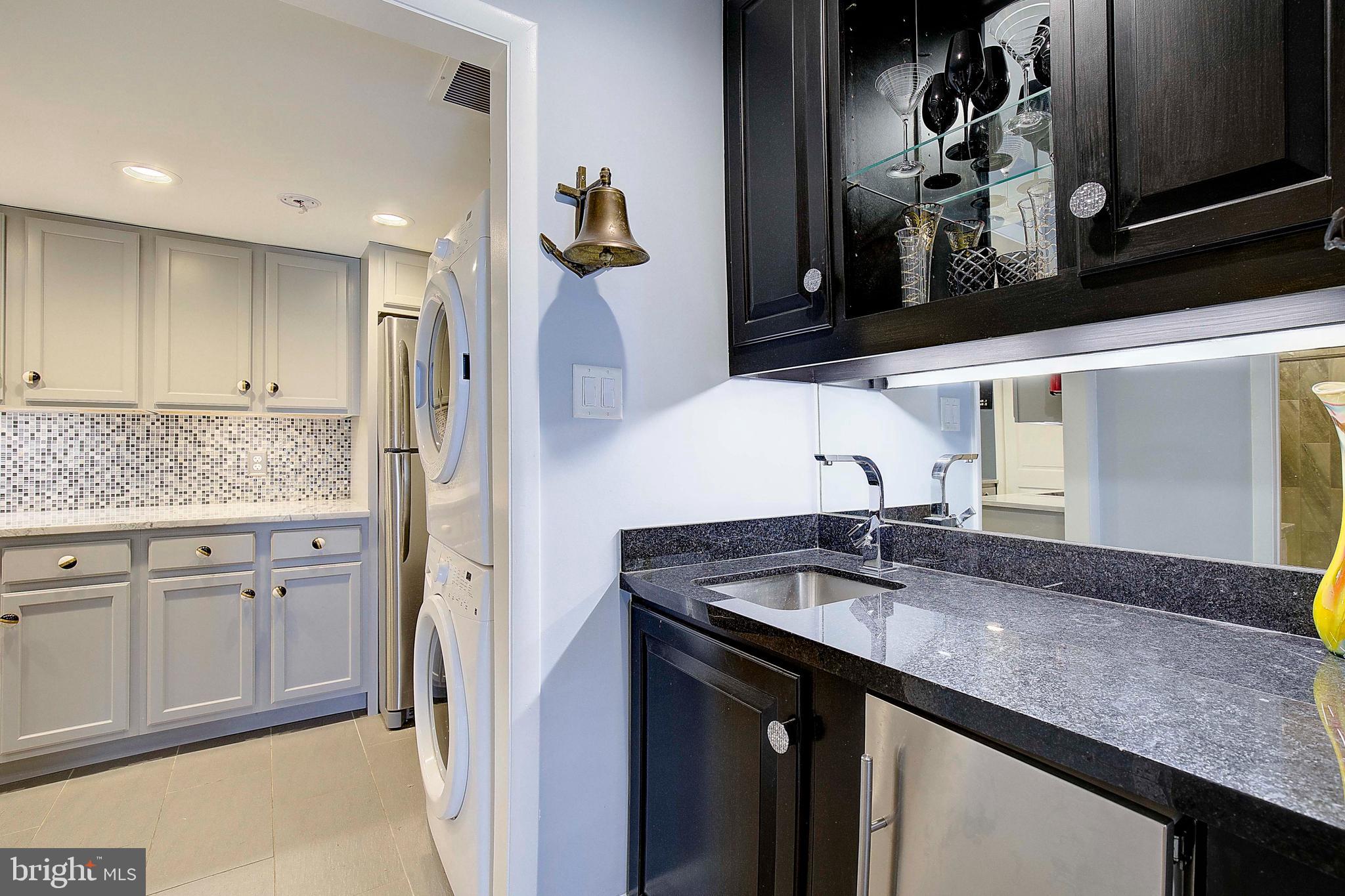 8 Eastern Avenue Annapolis, MD 21403 - Photo 24 of 55 a kitchen with stainless steel appliances granite countertop a sink and cabinets