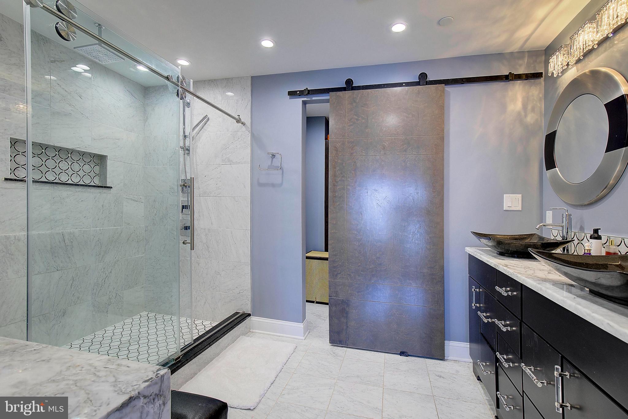 8 Eastern Avenue Annapolis, MD 21403 - Photo 32 of 55 a bathroom with a sink and a mirror