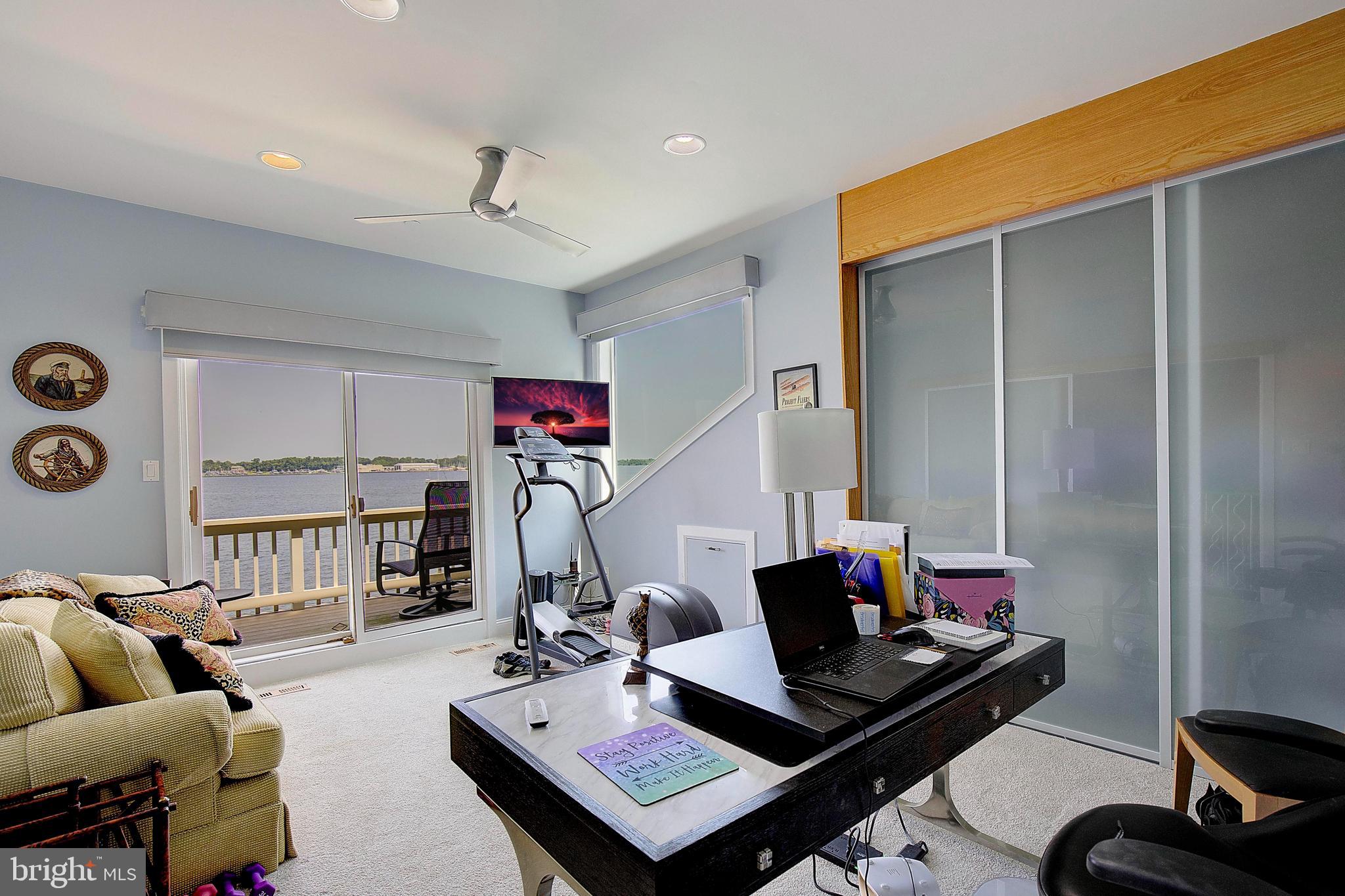 8 Eastern Avenue Annapolis, MD 21403 - Photo 34 of 55 a living room with furniture and a flat screen tv