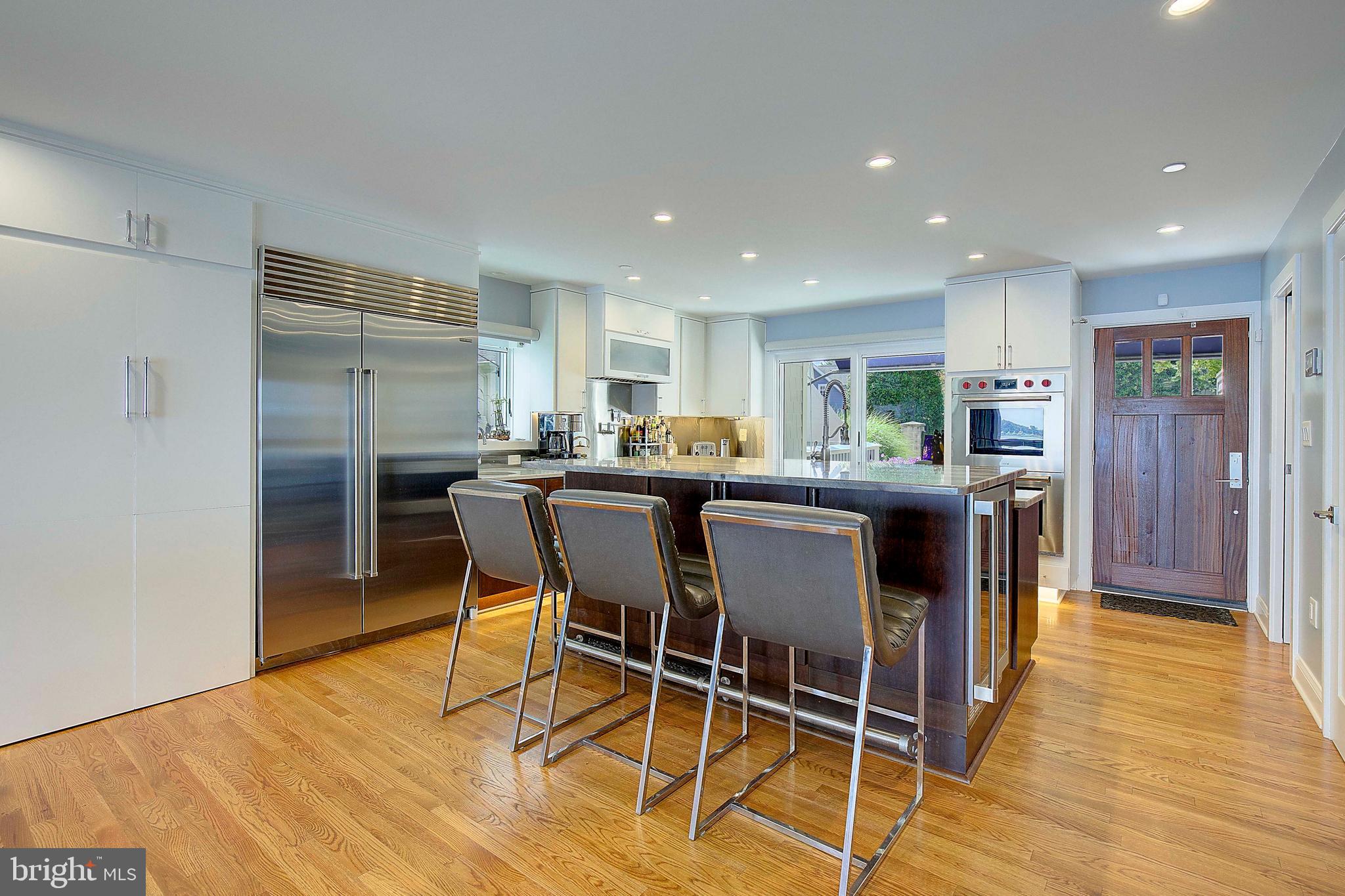 8 Eastern Avenue Annapolis, MD 21403 - Photo 10 of 55 a open kitchen with stainless steel appliances granite countertop a refrigerator and a stove top oven