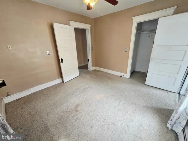 an empty room with closet