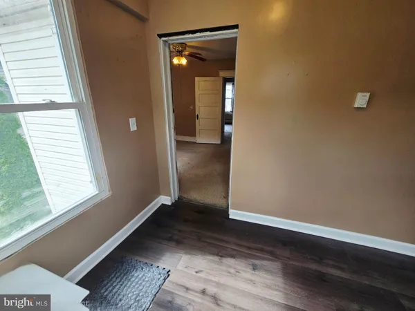 a bathroom with a sink a toilet and a shower