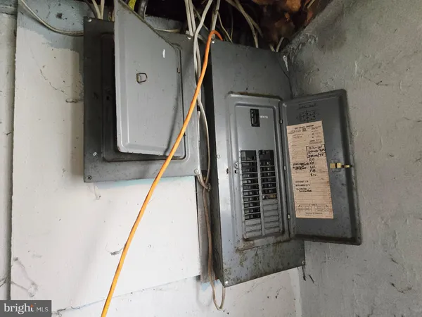 a view of an entryway with a mirror