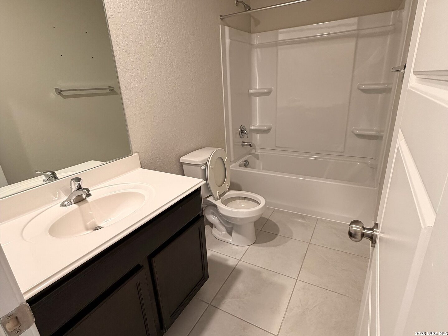 20929 Pleasanton Road San Antonio, TX 78264 - Photo 40 of 51 a bathroom with a sink a toilet and shower