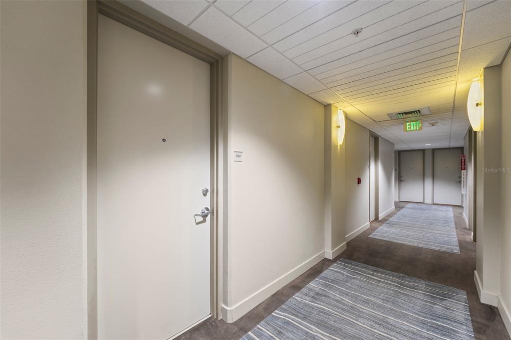 150 East Robinson Street, Unit 1007 Orlando, FL 32801 - Photo 5 of 31 a view of a hallway