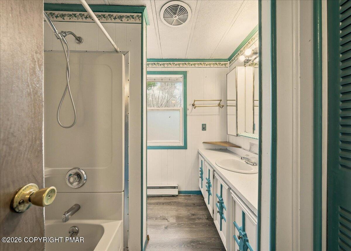 3416 Walnut Road Gilbert, PA 18331 - Photo 23 of 27 a bathroom with a shower and a sink