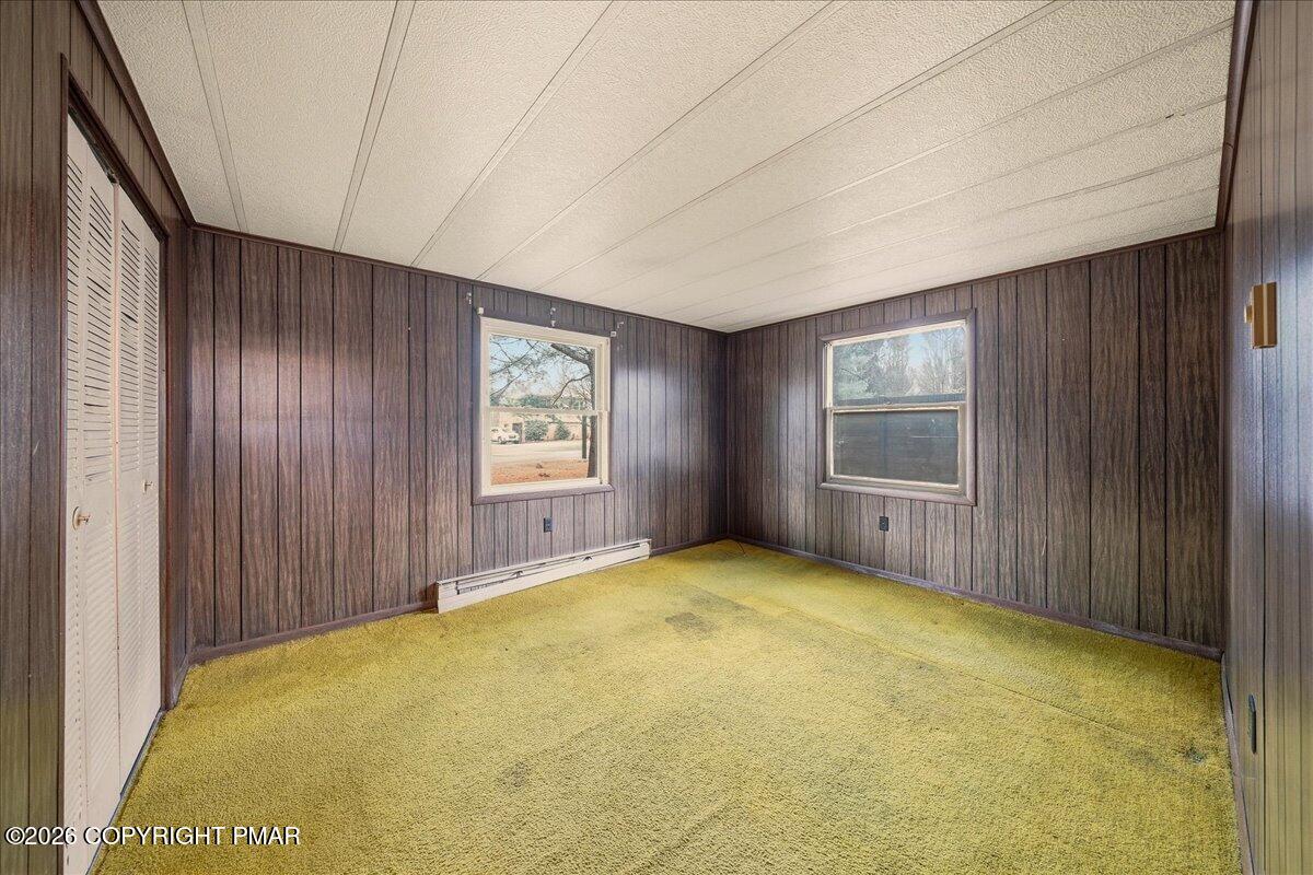 3416 Walnut Road Gilbert, PA 18331 - Photo 26 of 27 a view of an empty room with windows