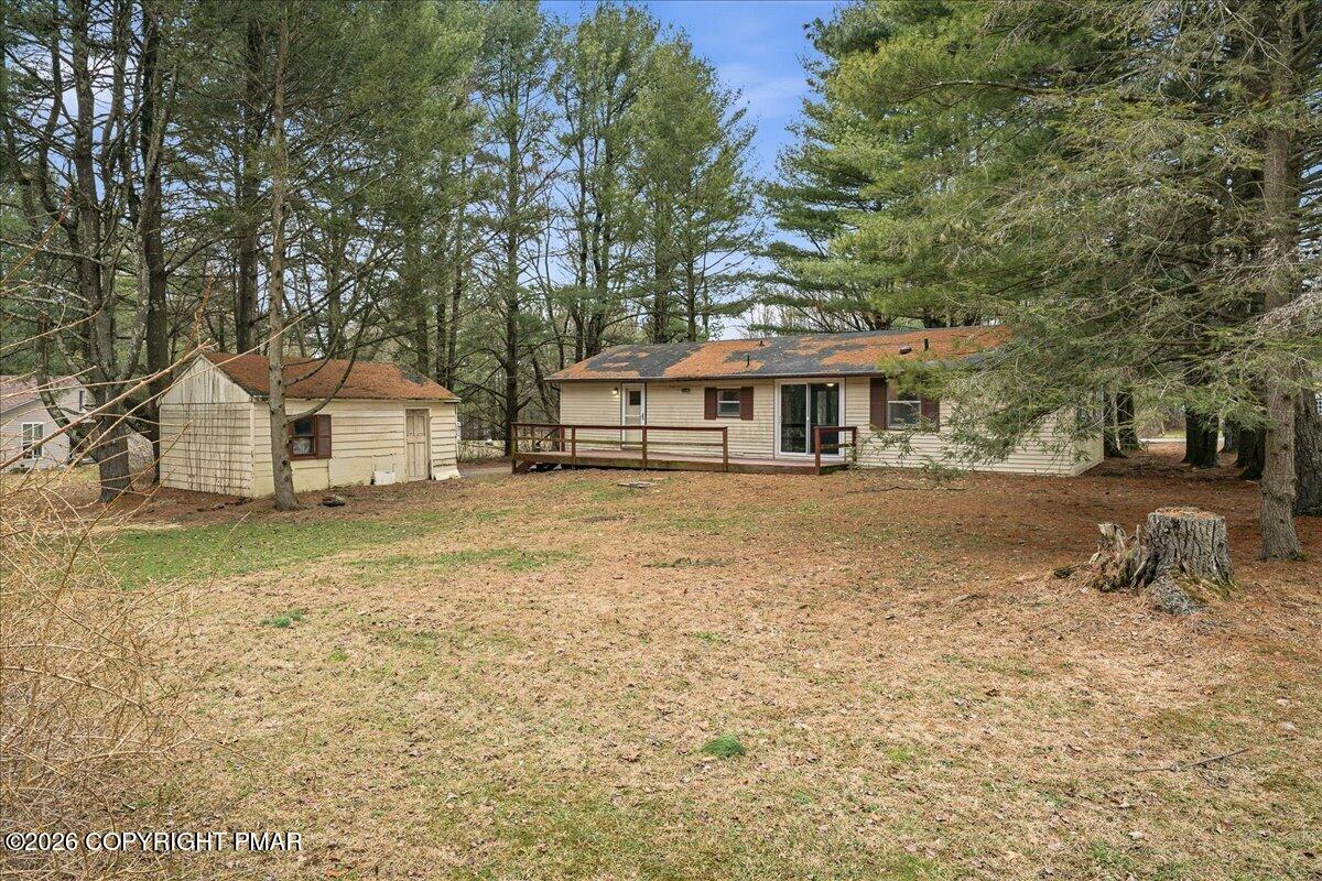 3416 Walnut Road Gilbert, PA 18331 - Photo 6 of 27 a front view of a house with a yard