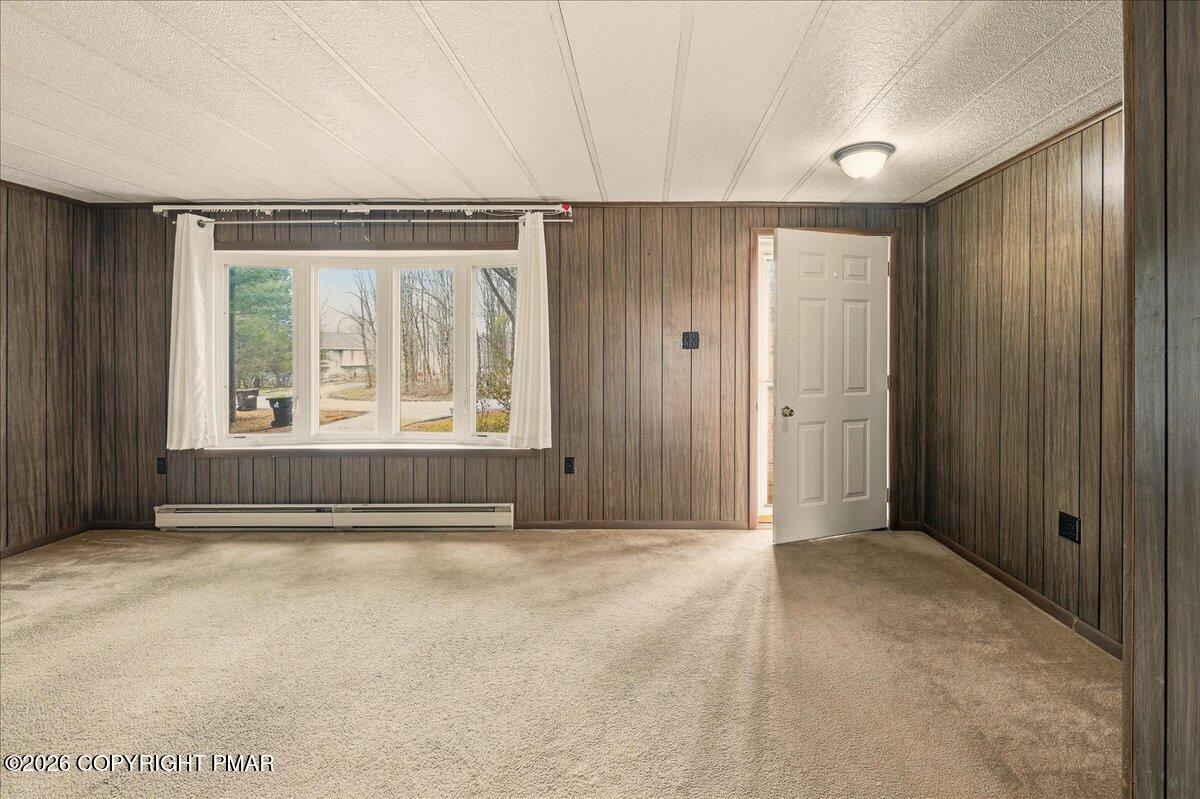 3416 Walnut Road Gilbert, PA 18331 - Photo 8 of 27 an empty room with windows