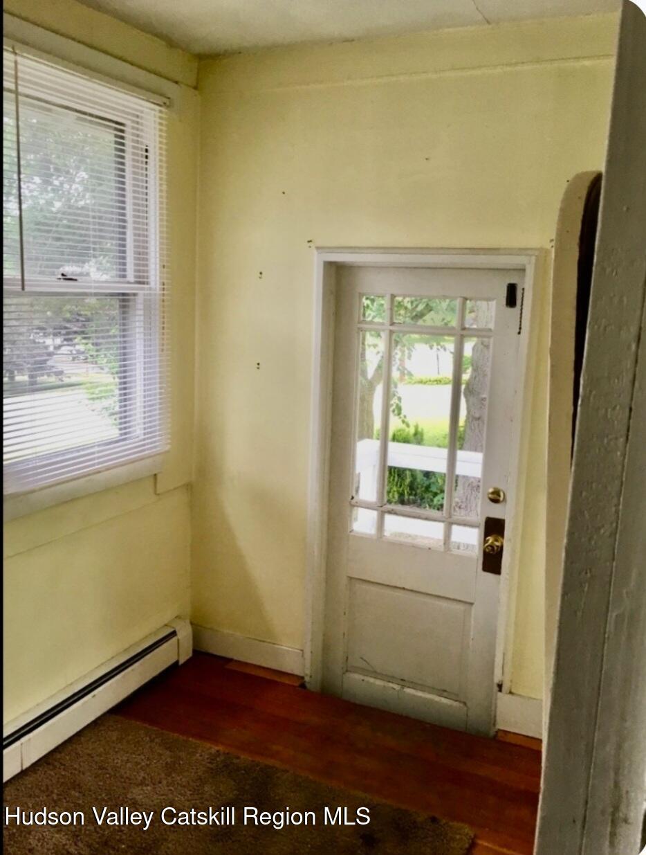 351-353 Old Rte 209 Hurley, NY 12443 - Photo 6 of 14 a view of a small space with wooden floor and a window