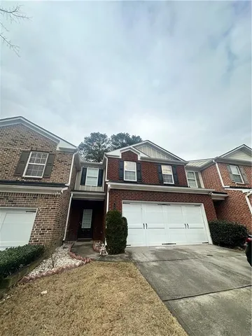 a front view of a house with a balcony