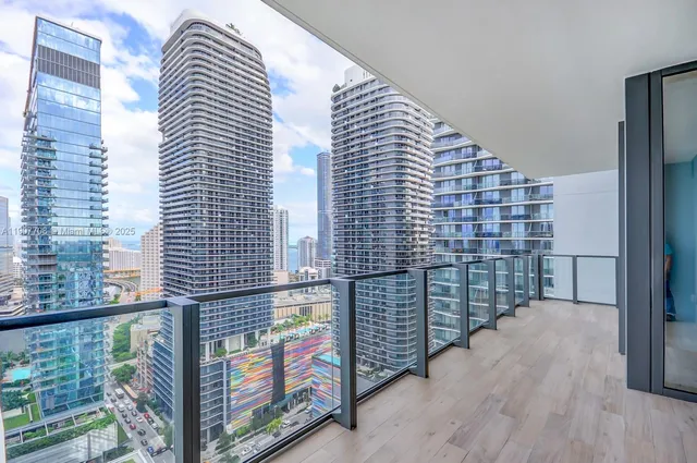 a kitchen with a sink a stove and cabinets
