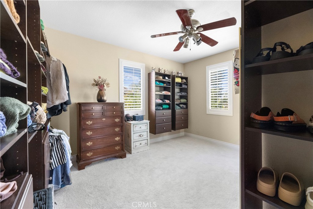43312 Dodaro Drive Temecula, CA 92592 - Photo 33 of 58 a view of a livingroom with furniture and a window
