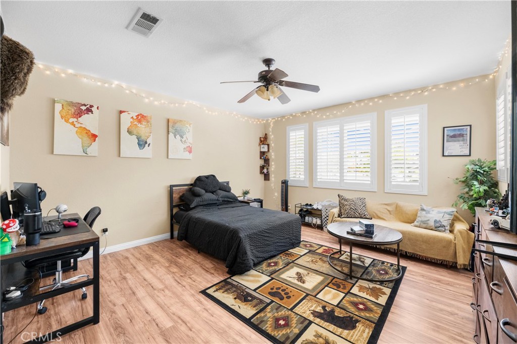 43312 Dodaro Drive Temecula, CA 92592 - Photo 39 of 58 a living room with furniture rug and window