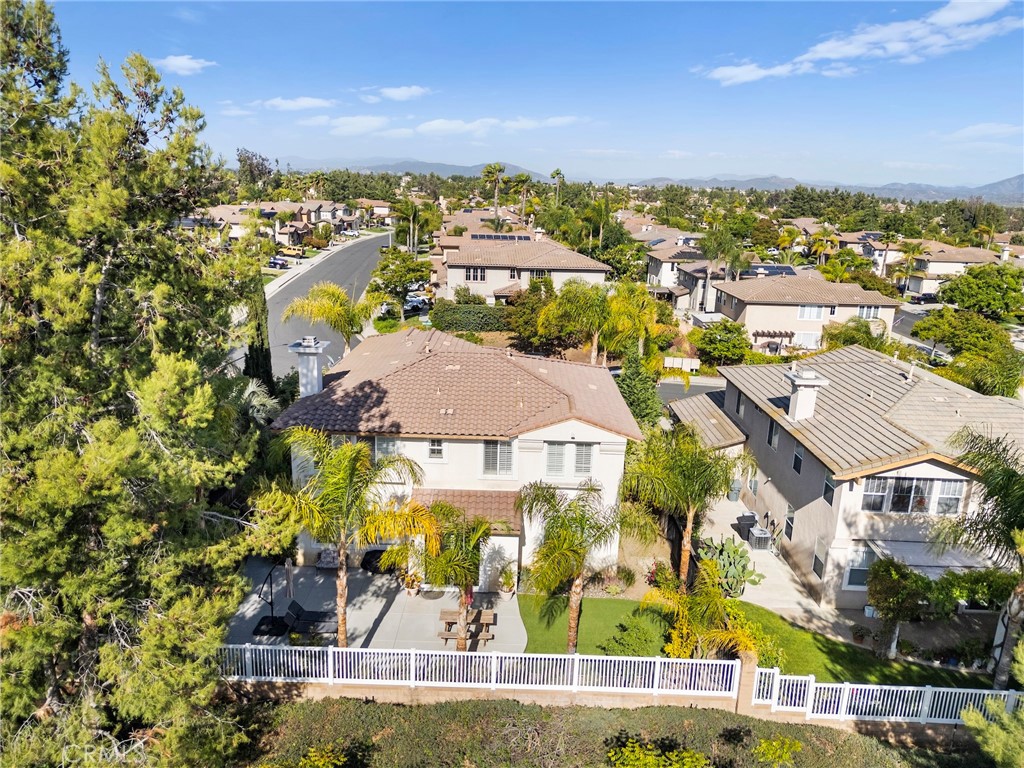 43312 Dodaro Drive Temecula, CA 92592 - Photo 55 of 58 an aerial view of residential houses with outdoor space and swimming pool