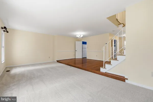 a view of a room with stairs and stairs