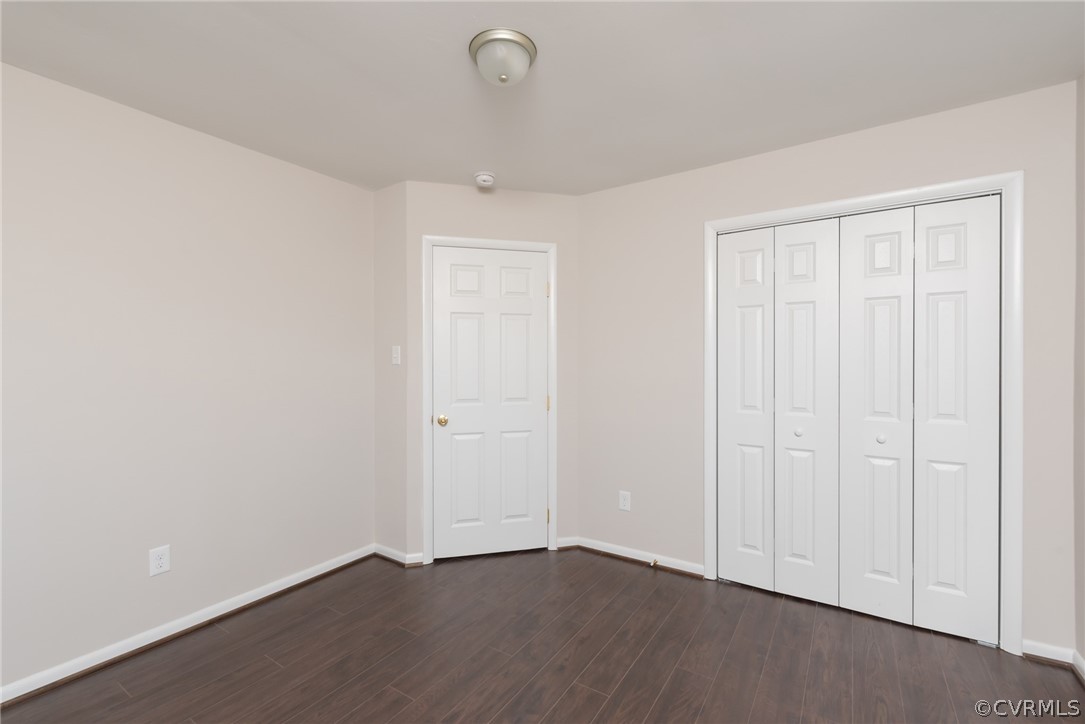 13423 Old Stage Road Chester, VA 23836 - Photo 16 of 25 a view of an empty room with wooden floor