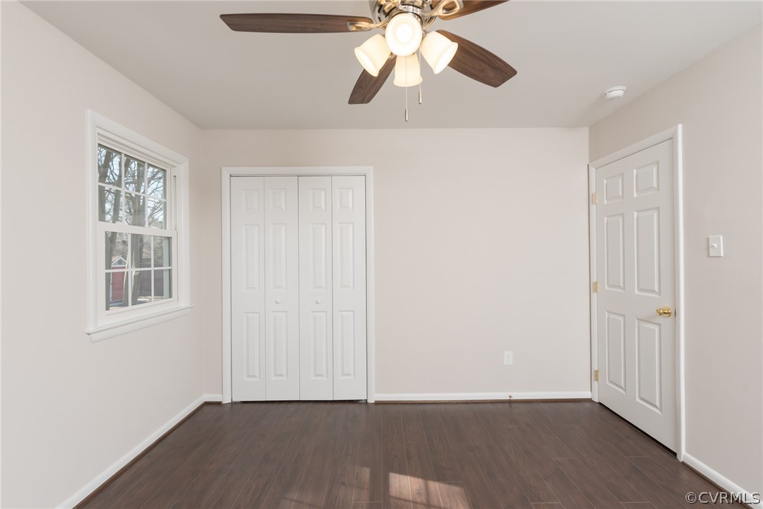 13423 Old Stage Road Chester, VA 23836 - Photo 10 of 25 an empty room with windows and fan