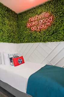 a living room with a couch and a flat screen tv