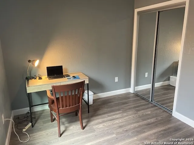 a bathroom with a bathtub and a toilet