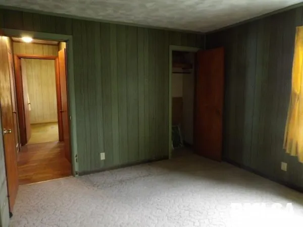 an empty room with closet