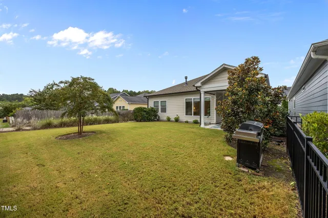 a view of a yard with an outdoor space
