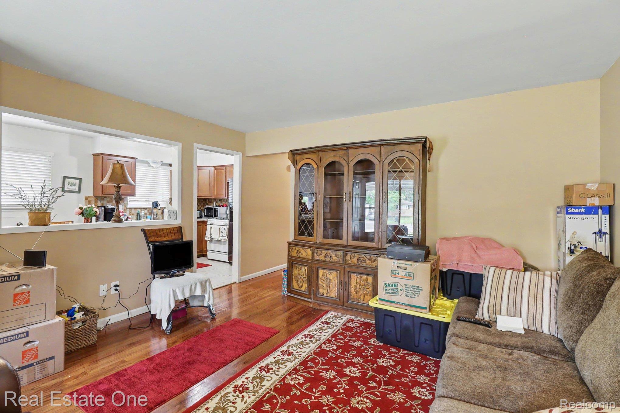 6305 Beech Daly Road Taylor, MI 48180 - Photo 8 of 22 Living room featuring light wood finished floors and baseboards