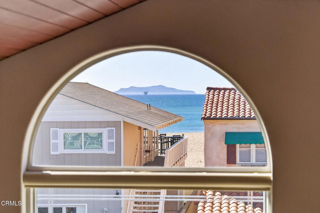 2408 Ocean Drive Oxnard, CA 93035 - Photo 5 of 58 a view of a brick house with a large windows