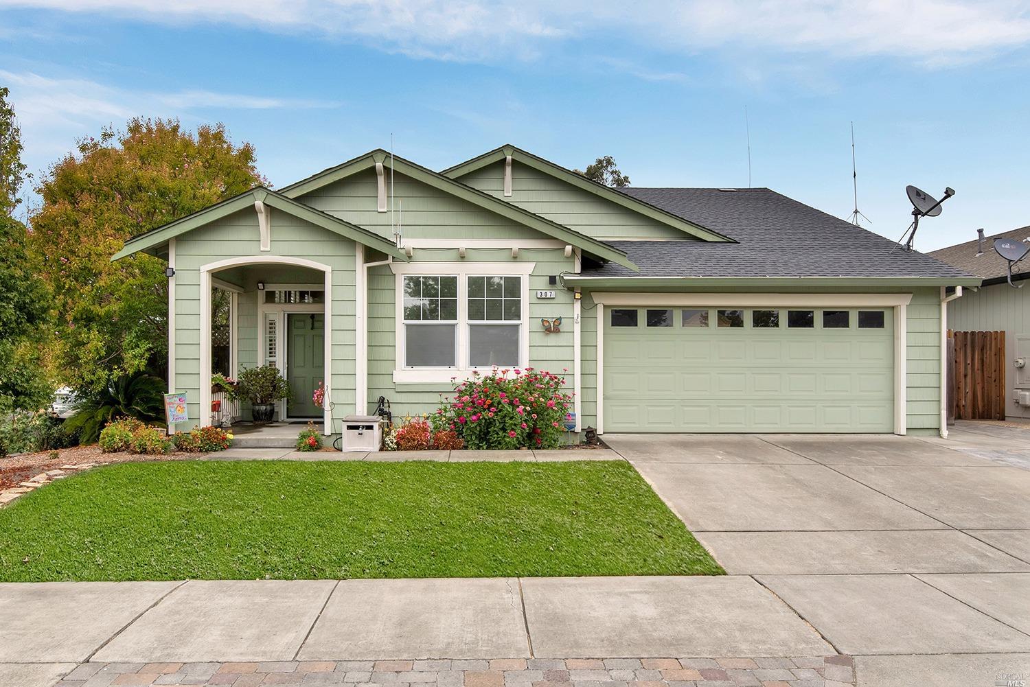 307 Burt Street Santa Rosa, CA 95404 - Photo 1 of 1 a front view of house with yard and green space