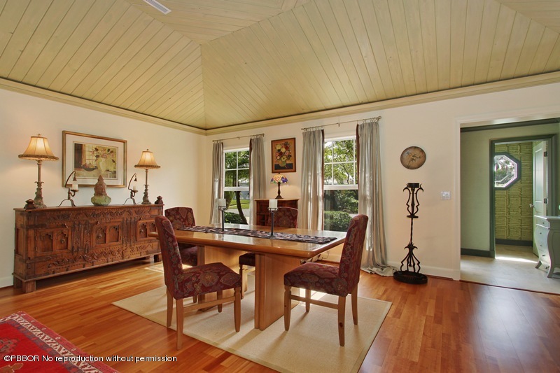 241 Orange Grove Road Palm Beach, FL 33480 - Photo 4 of 10 a view of a dining room with furniture window and wooden floor