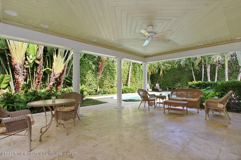 241 Orange Grove Road Palm Beach, FL 33480 - Photo 7 of 10 a living room with furniture and a large window
