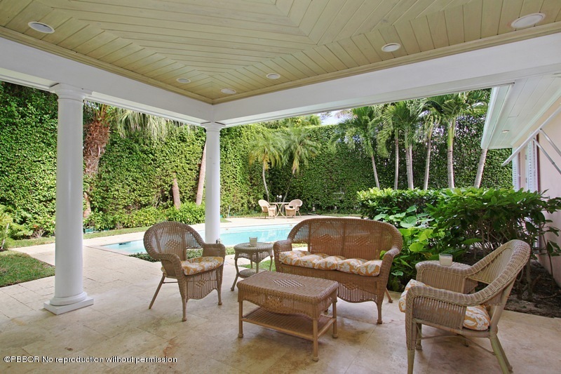 241 Orange Grove Road Palm Beach, FL 33480 - Photo 8 of 10 a outdoor living space with furniture and garden view
