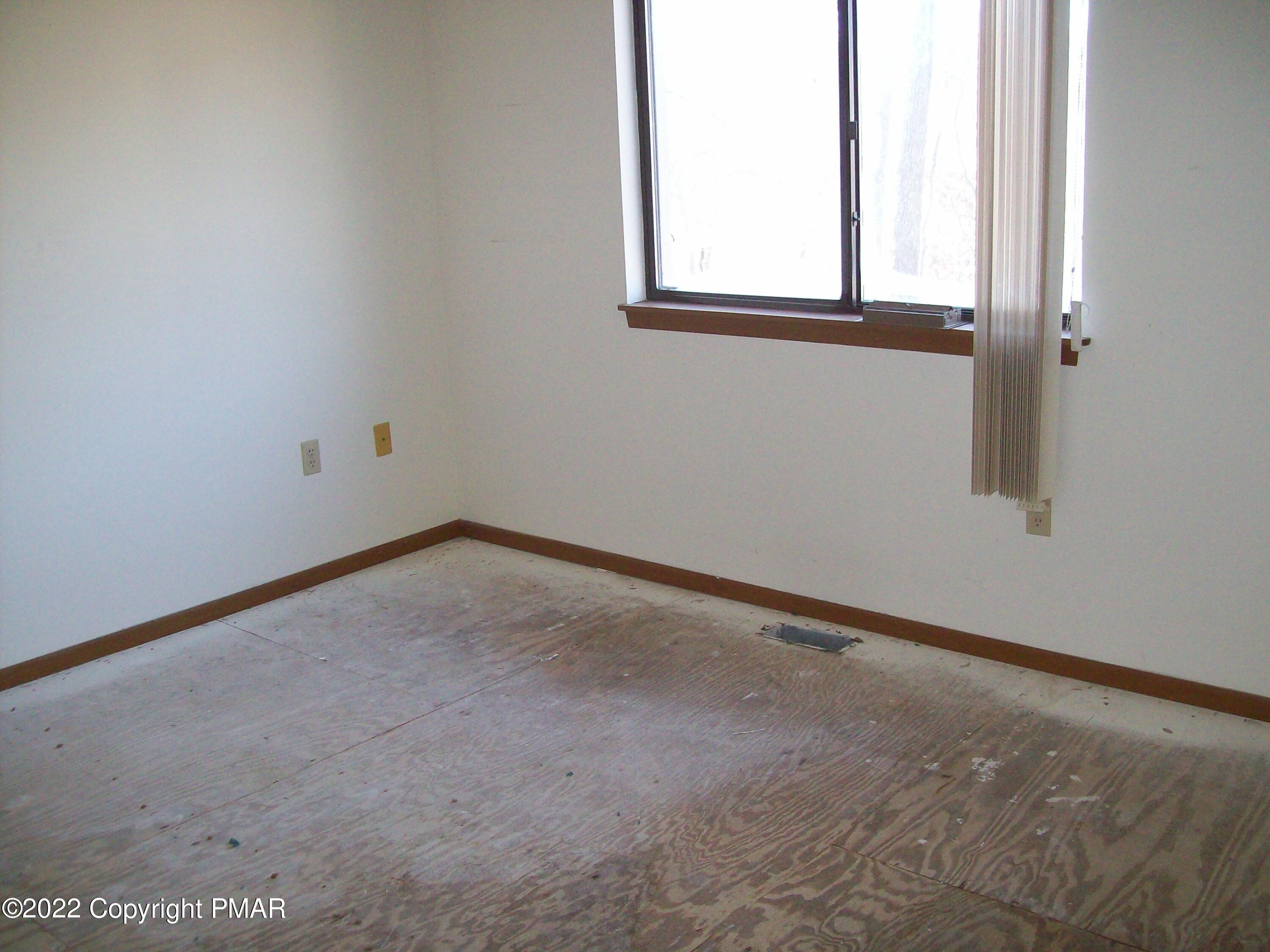 3305 Windemere Drive Bushkill, PA 18324 - Photo 13 of 18 an empty room with a window