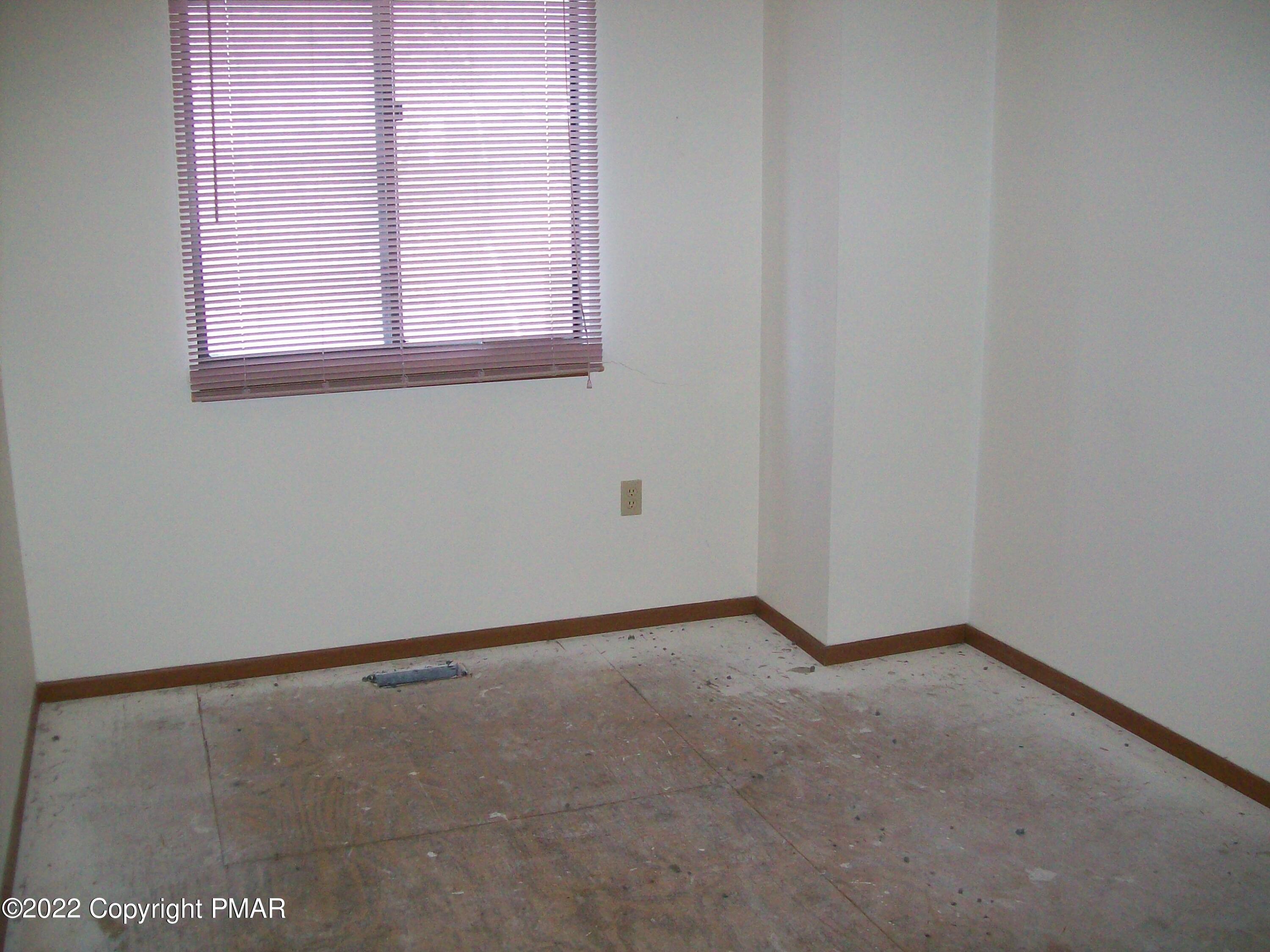 3305 Windemere Drive Bushkill, PA 18324 - Photo 14 of 18 an empty room with a window