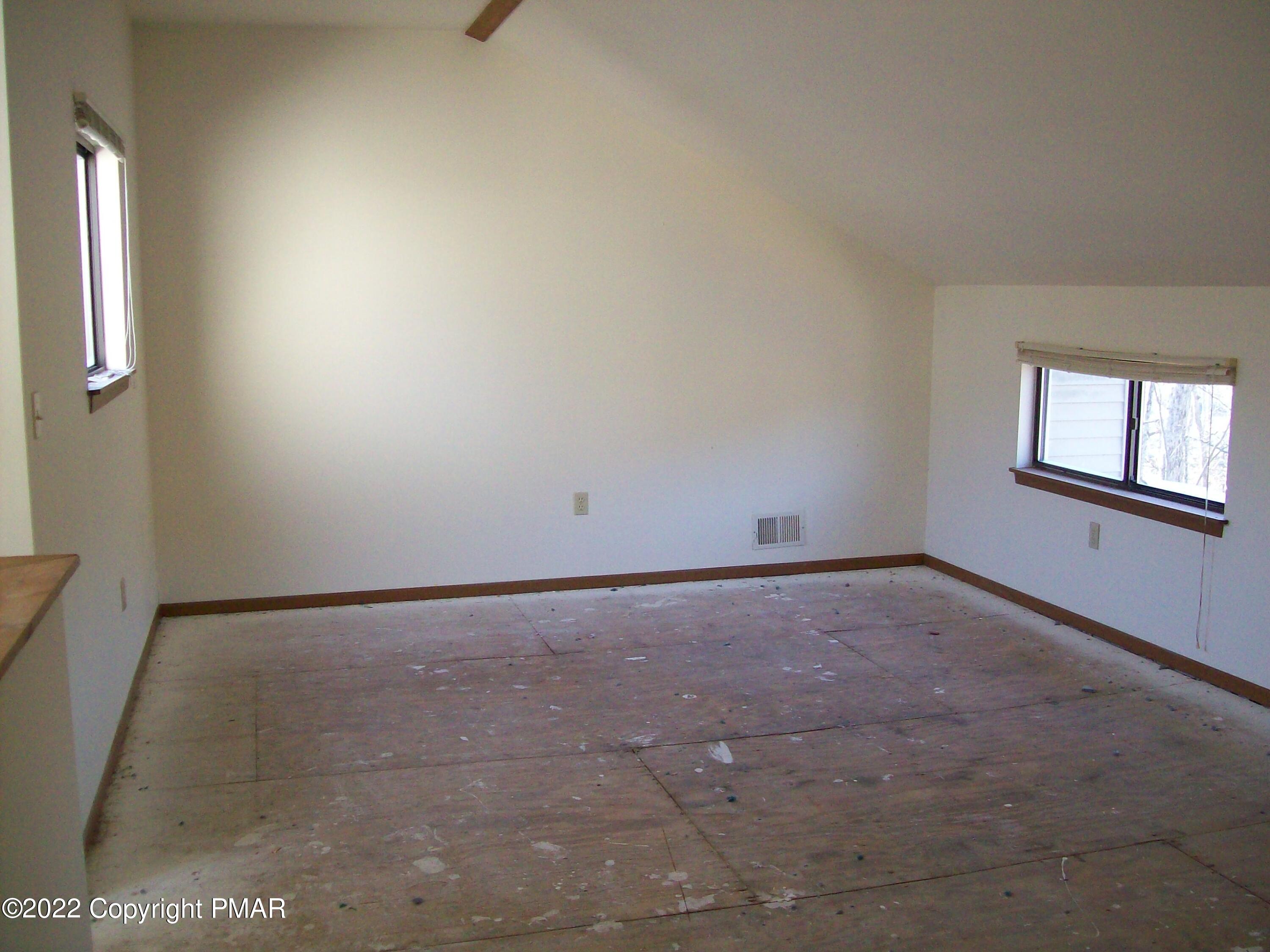 3305 Windemere Drive Bushkill, PA 18324 - Photo 15 of 18 an empty room with windows