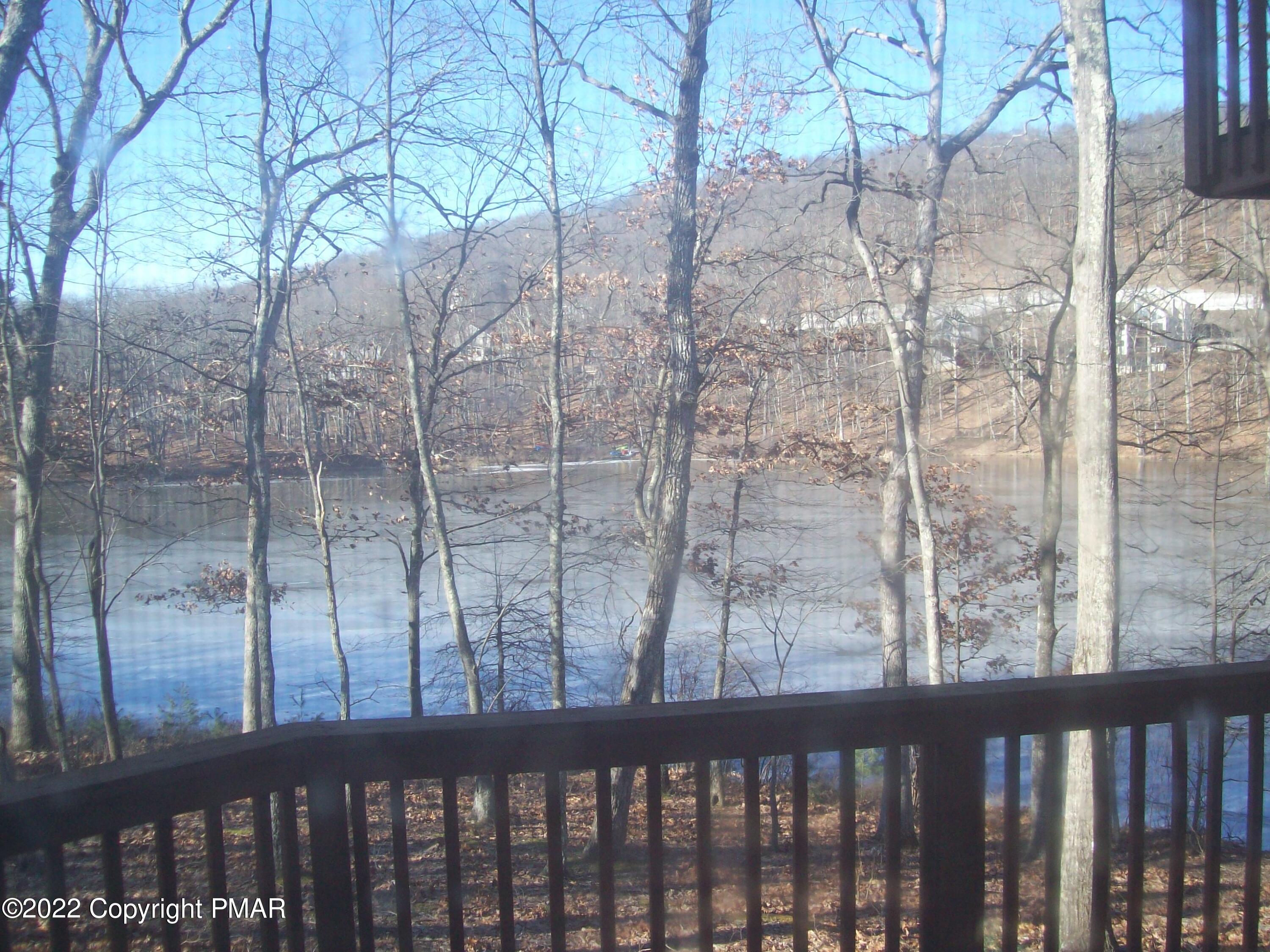 3305 Windemere Drive Bushkill, PA 18324 - Photo 9 of 18 a view of a balcony with a tree