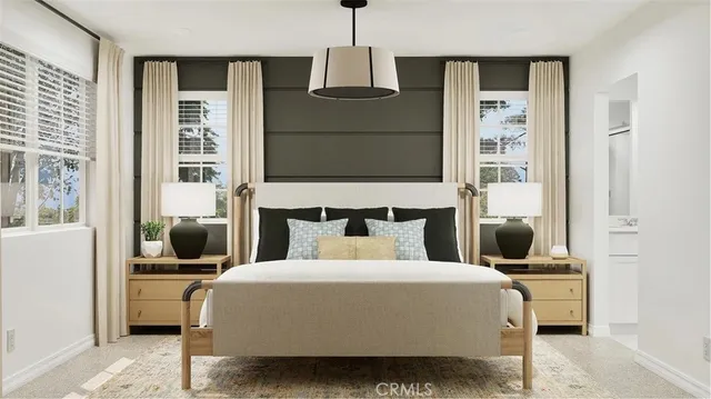 a bedroom with a bed and glass window