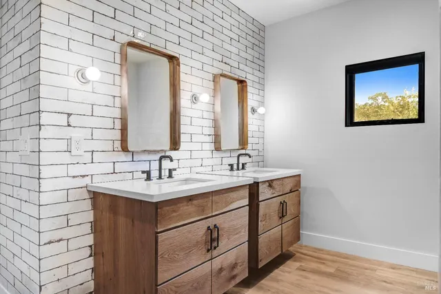 a bathroom with a shower and a sink