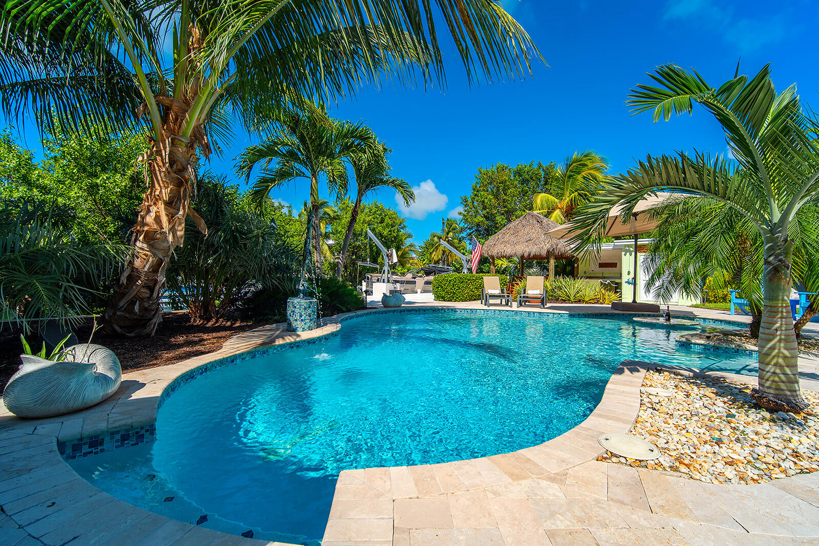 17275 Keystone Road Sugarloaf, FL 33042 - Photo 21 of 69 Travertine pavers around the pool