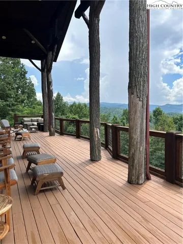 a view of couches with wooden floor